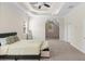 Spacious main bedroom featuring a decorative trey ceiling, and sitting nook at 3113 Brians Creek Se Dr, Conyers, GA 30013