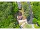 Aerial perspective of the house, revealing its well-manicured surroundings and tranquil neighborhood setting at 3430 Shorelake Dr, Tucker, GA 30084