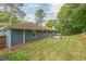 Blue brick house with a large backyard and patio at 3430 Shorelake Dr, Tucker, GA 30084