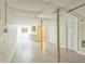 Unfinished basement with drop ceiling and built-in cabinets and white storage closet at 3430 Shorelake Dr, Tucker, GA 30084
