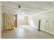 Unfinished basement with a beige wall and tile ceiling at 3430 Shorelake Dr, Tucker, GA 30084