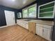 Kitchen featuring ample counter space, cabinets, and natural light from the windows at 39 N Broad St, Covington, GA 30014