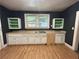 Kitchen with lots of natural light, ample counter space and room for upgrades at 39 N Broad St, Covington, GA 30014