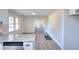Charming kitchen with new countertops and view of dining area providing an open and inviting space at 4551 Salem Rd, Covington, GA 30016