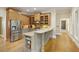 Well-equipped kitchen featuring stainless steel appliances and granite countertops at 5595 Timson Ln, Johns Creek, GA 30022