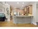 Spacious kitchen with stainless steel appliances and granite countertops at 5595 Timson Ln, Johns Creek, GA 30022
