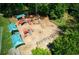 Overhead shot of the community playground with slides and climbing areas at 5595 Timson Ln, Johns Creek, GA 30022