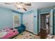 Bedroom featuring a window seat, large closet, and hardwood floors with an ensuite at 72 Griggs Sw St, Marietta, GA 30064
