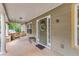Inviting front porch with wooden porch swings and columns at 72 Griggs Sw St, Marietta, GA 30064