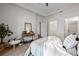 Bright, carpeted bedroom featuring a view into a bathroom and walk-in closet for added convenience at 850 Piedmont Ne Ave # 1409, Atlanta, GA 30308