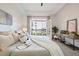 Relaxing bedroom with a balcony view, stylish decor, and ample natural light for a tranquil space at 850 Piedmont Ne Ave # 1409, Atlanta, GA 30308