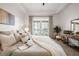 Bright bedroom with balcony access and a cozy interior design at 850 Piedmont Ne Ave # 1409, Atlanta, GA 30308
