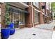 Building exterior showing entryway to 'The Dakota' condo community at 850 Piedmont Ne Ave # 1409, Atlanta, GA 30308
