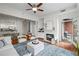 Living room with fireplace and access to a private balcony, open to the kitchen at 850 Piedmont Ne Ave # 1409, Atlanta, GA 30308