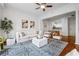 Spacious living room with hardwood floors, a ceiling fan, and an open view to the kitchen at 850 Piedmont Ne Ave # 1409, Atlanta, GA 30308
