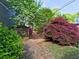 Secluded backyard entrance gate framed by colorful foliage, offering a private retreat at 2859 Seagrave Way, Marietta, GA 30066