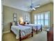 Bright bedroom with twin beds, ceiling fan, and shuttered windows at 2859 Seagrave Way, Marietta, GA 30066