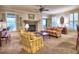 Comfortable living room features a stone fireplace, neutral walls, and bright windows for a cozy and inviting atmosphere at 2859 Seagrave Way, Marietta, GA 30066