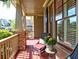 Cozy porch area with comfortable seating, stone accents, and natural light create a relaxing outdoor space at 2859 Seagrave Way, Marietta, GA 30066