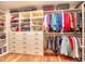 Large walk-in closet with custom shelving, drawers, and hanging space at 2859 Seagrave Way, Marietta, GA 30066