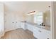 Bathroom with double vanity, and ample storage space at 9482 Deer Crossing Ln, Jonesboro, GA 30236