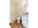 Bright bathroom featuring a shower-tub combo, toilet and vanity at 9482 Deer Crossing Ln, Jonesboro, GA 30236