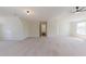 Expansive bonus room offers versatile living space and natural light at 9482 Deer Crossing Ln, Jonesboro, GA 30236