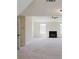 Spacious living room with fireplace and ample natural light at 9482 Deer Crossing Ln, Jonesboro, GA 30236