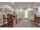 Game room with dark wood floors, a high-top table and chairs, and backyard access at 973 Duncan Ter, Canton, GA 30115