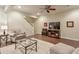Comfortable living room boasting wood floors, a ceiling fan, and ample natural light at 973 Duncan Ter, Canton, GA 30115