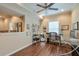 Bright office with ample natural light, wood floors, and an open view of the game room at 973 Duncan Ter, Canton, GA 30115