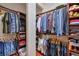 Organized walk-in closet with custom shelving, hanging racks, and ample storage space at 973 Duncan Ter, Canton, GA 30115