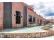 Community features near property including decorative water feature and attractive brick building at 1242 Ainsworth Aly # 40, Sugar Hill, GA 30518