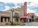 Commercial building with brick facade, outdoor lights, and a decorative entrance at 1242 Ainsworth Aly # 40, Sugar Hill, GA 30518