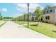 Street view of new townhomes in a suburban neighborhood with sidewalks and landscaping at 1242 Ainsworth Aly # 40, Sugar Hill, GA 30518