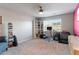 Comfortable bedroom with a ceiling fan, large window, and versatile bookshelf at 360 Winston Cir, Canton, GA 30114