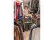 Organized walk-in closet with hanging rods and shelves for clothing and accessories at 360 Winston Cir, Canton, GA 30114