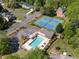 Expansive aerial view showcasing the pool, tennis court, and well-maintained community in a desirable neighborhood at 4442 Freeman Rd, Marietta, GA 30062