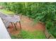 Backyard space featuring a wooden fence and stairs leading down to the outdoor space at 4442 Freeman Rd, Marietta, GA 30062