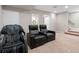Finished basement with comfortable seating and easy access to other rooms in the house at 4442 Freeman Rd, Marietta, GA 30062