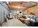 Unfinished basement featuring exposed wood ceiling, concrete walls, and visible utilities at 4442 Freeman Rd, Marietta, GA 30062
