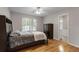 Bedroom features hardwood floors and a view of a bathroom at 4442 Freeman Rd, Marietta, GA 30062