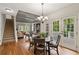 Open dining area with wood floors and large windows with access to the outdoor at 4442 Freeman Rd, Marietta, GA 30062