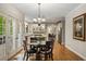 Open concept kitchen and dining area features an island with seating and deck access at 4442 Freeman Rd, Marietta, GA 30062
