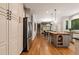 Open kitchen featuring stainless steel refrigerator, island, hardwood flooring and view into dining area at 4442 Freeman Rd, Marietta, GA 30062