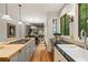 Bright kitchen with a butcher block island, hardwood floors and stainless steel appliances at 4442 Freeman Rd, Marietta, GA 30062