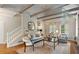 Bright living room with fireplace, beamed ceilings and large windows provide lots of natural light at 4442 Freeman Rd, Marietta, GA 30062