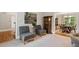 Bright living room featuring plush carpet, artwork, and views of the dining room at 4442 Freeman Rd, Marietta, GA 30062
