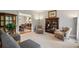 Comfortable living room with neutral carpet, sitting area, and view into dining room at 4442 Freeman Rd, Marietta, GA 30062