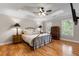 Spacious main bedroom features a tray ceiling, hardwood floors, and natural light at 4442 Freeman Rd, Marietta, GA 30062